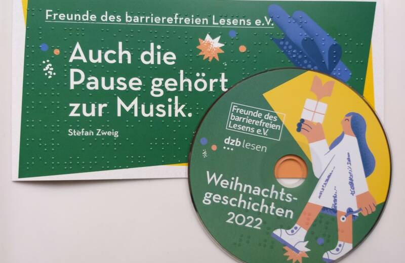 Foto von der Vorderseite der Weihnachtskarte 2022 mit dem Text: Freunde des barrierefreien Lesens e.V. "Auch die Pause gehört zur Musik" (Stefan Zweig) und der CD